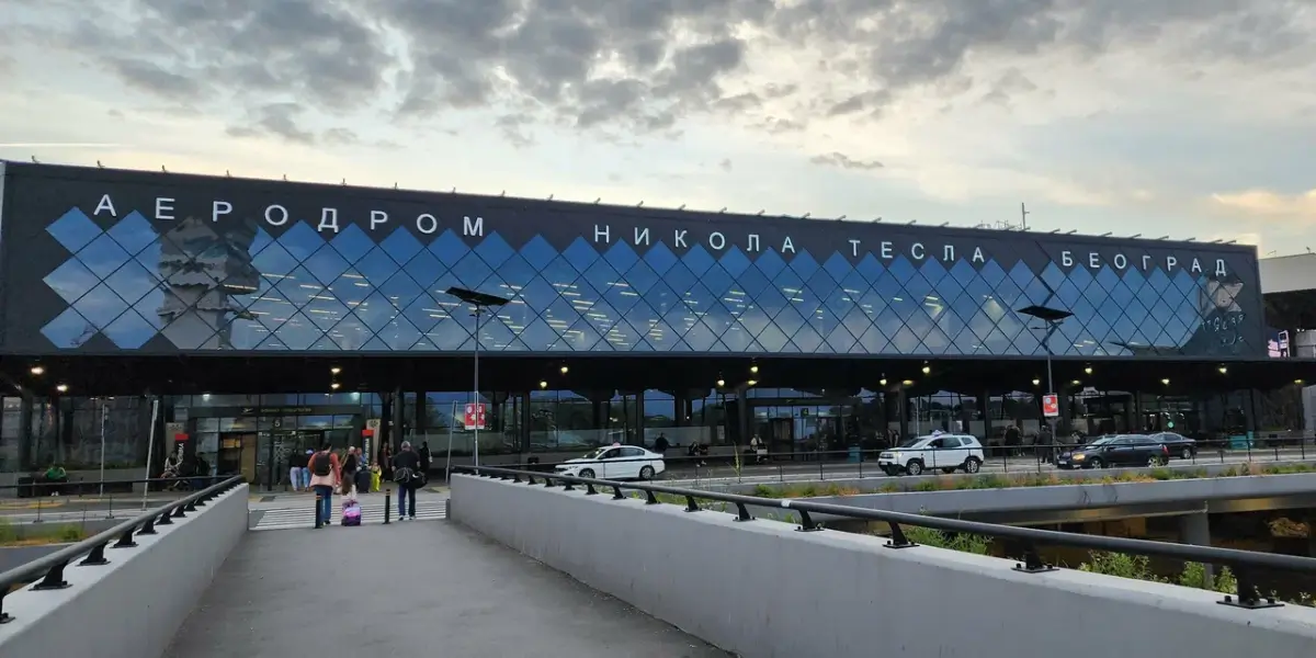 Belgrade Nikola Tesla Airport arrivals hall — transport options to city center 2026