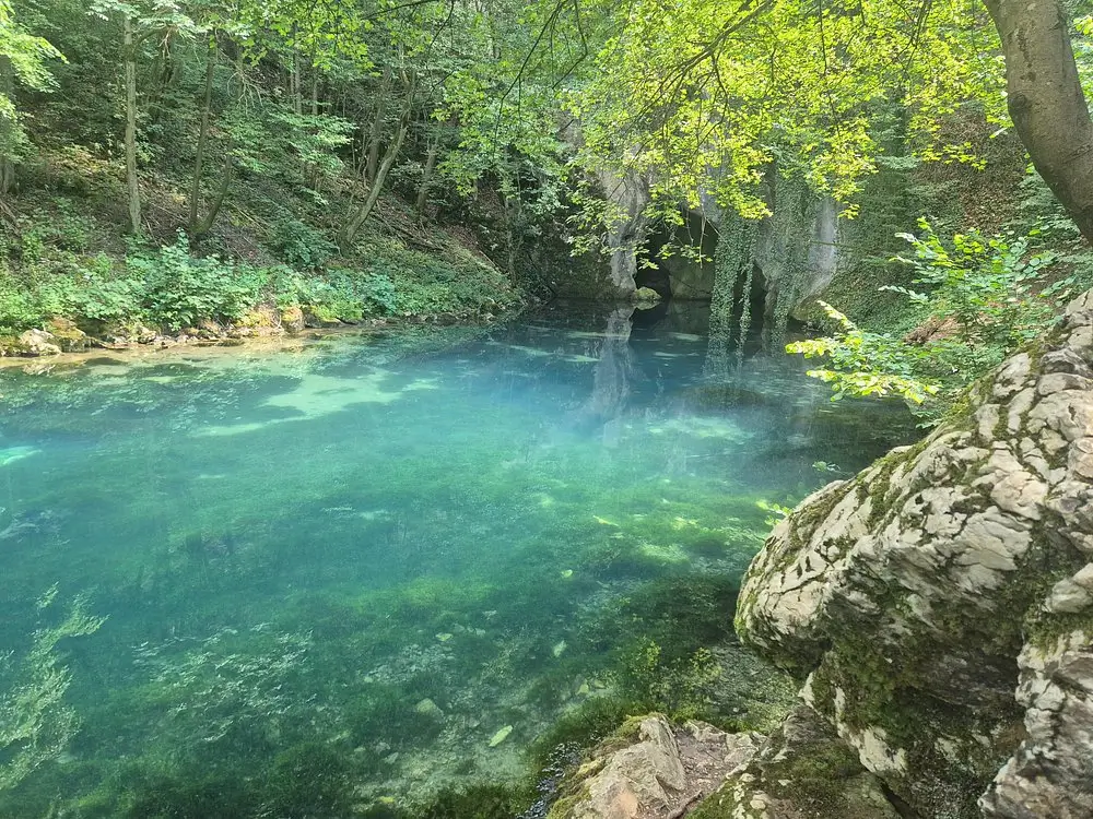 Krupaj Spring turquoise water — private day trip from Belgrade